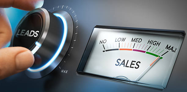Generate More Leads and Sales Hand turning a knob to set number of leads to the maximum to generate more sales. Composite image between a photography and a 3D background. Horizontal orientation. potential energy stock pictures, royalty-free photos & images