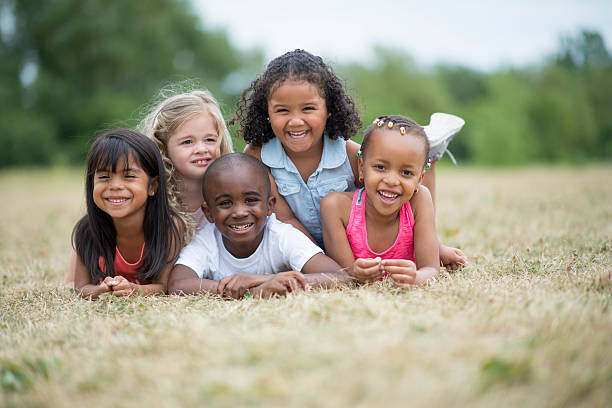 istock Children Giggling Outside 624566370