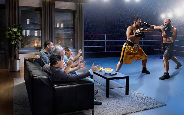 istock Adults watching Boxing at home 624569288
