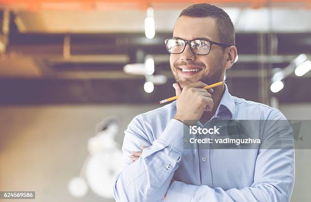 Handsome Businessman Working Stock Photo - Download Image Now - Contemplation, Day Dreaming, Dreamlike