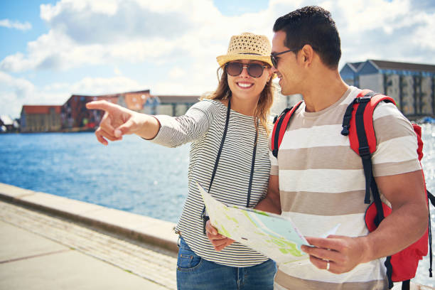 istock Young couple sightseeing on vacation 624569798