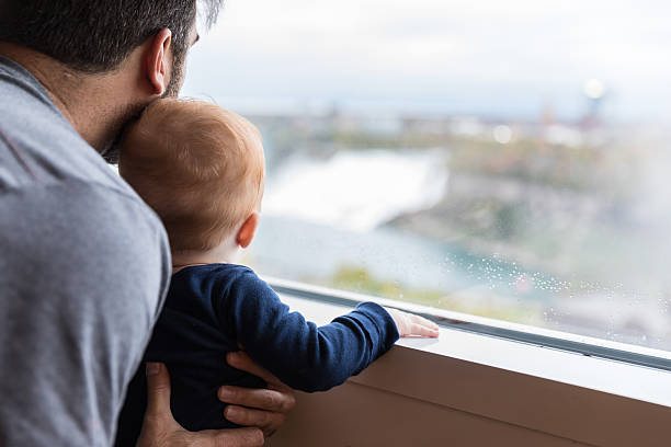 istock Father and Baby Boy at Niagara Falls 624570824