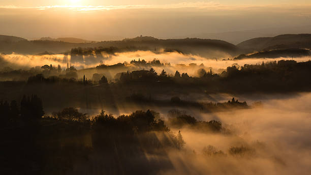istock Tuscany Countryside in Sunset colours with Sun Rays 624570830