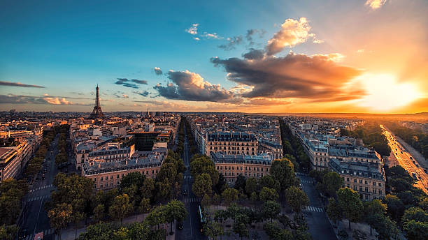 Sunset over Paris and the Eiffel tower Paris viewed from the Arc de Triomphe  triumphal arch photos stock pictures, royalty-free photos & images