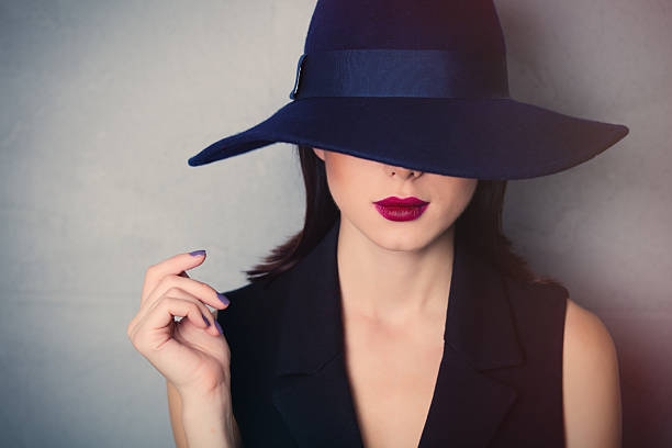 istock brunette woman in hat 624593246