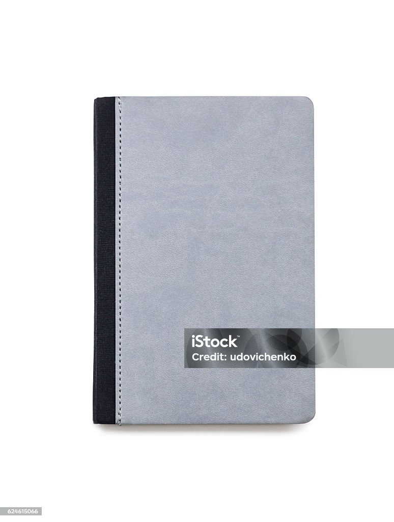 Little gray notepad isolated Little gray closed book isolated on white background with stitched black cover Address Book Stock Photo