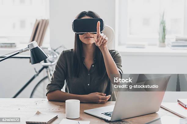 Vr Technologies Stock Photo - Download Image Now - Bicycle, Businesswoman, Portable Information Device