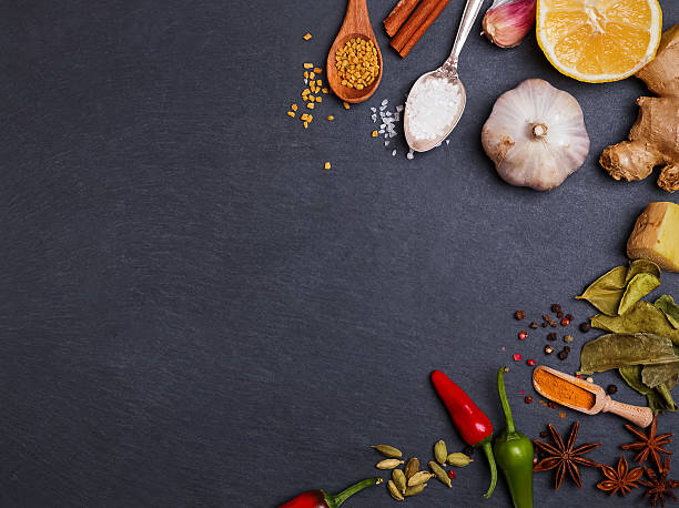 istock Dry and fresh spices on the black background. 624620296