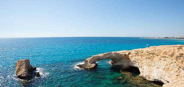 istock Stone cliff in a beautiful blue sea Cyprus 624625548