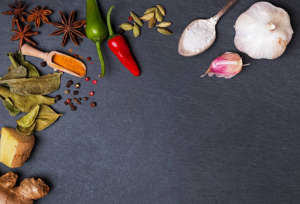 istock Dry and fresh spices on the black background. 624625694
