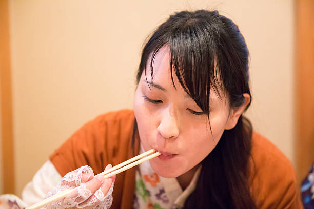 istock Young yukata woman eating lunch 624626080