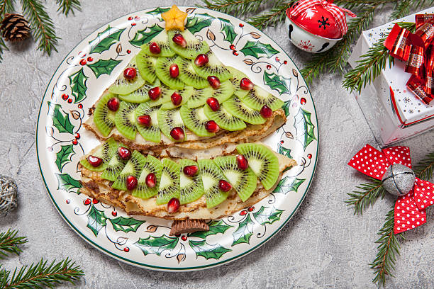 istock Christmas tree shaped sweet pancakes crepes for breakfast 624626860