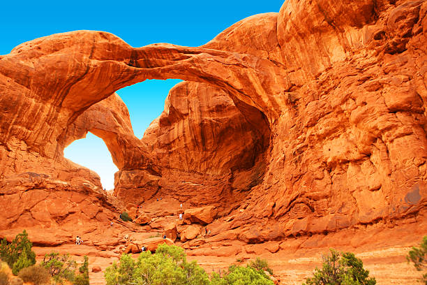 Double Arch in Arches National Park Utah Double Arch in Arches National Park, Utah, USA. natural bridges national park photos stock pictures, royalty-free photos & images