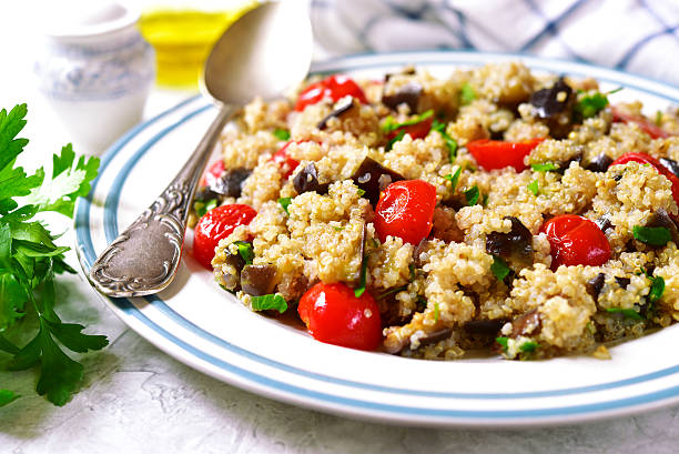 istock Quinoa with eggplants and grilled tomatoes. 624627834