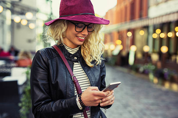 istock Woman texting on her smartphone 624628744