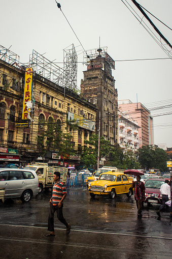 Kolkata, India - June 1, 2014: Typical kolkata street after a rainy shower.
