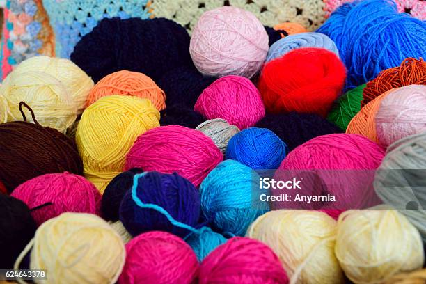 Colorful Yarn Balls In A Basket With Crochet Background Stock Photo -  Download Image Now - iStock