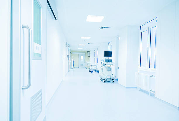 istock modern hospital corridor lit by a bright light 624644950