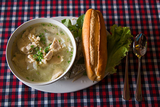 istock Vietnamese pho soup and a baguette in a cafe 624645068
