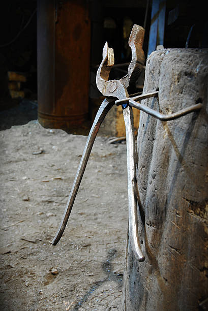 Blacksmith Tongs Tool Hanged In Forge Stock Photo - Download Image Now -  Blacksmith, Serving Tongs, Tongs - Work Tool - iStock