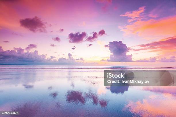 Sunset Over Sea On Bali Stock Photo - Download Image Now - Sunset, Sea, Pink Color