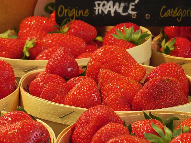 close up of strawberry punnets on French market stall