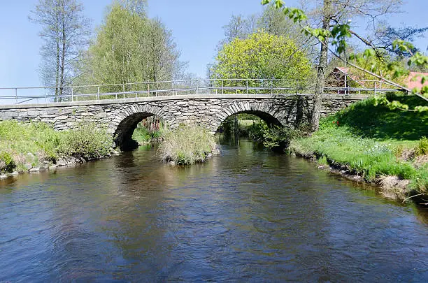 old stonebridge over the cold water one sunny day in early spring