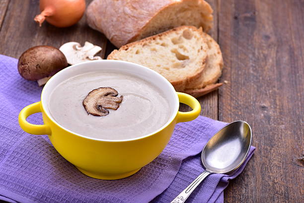 istock Mushroom cream soup on the wooden table. Copyspace. 624681324