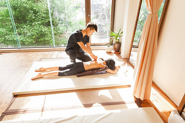 istock Acupuncturist during acupunture session in Kyoto 624682178