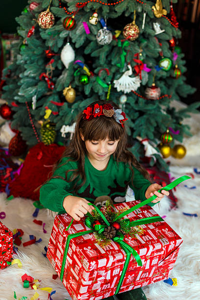 istock Girl Surprized by Gift Box 624684492