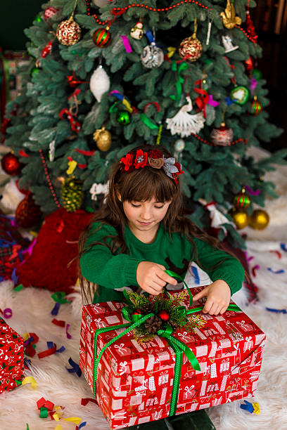 istock Girl Surprized by Gift Box 624684528