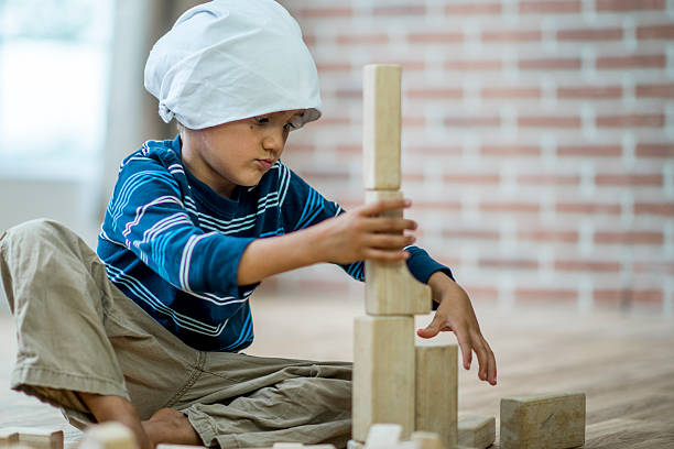 istock Child with Leukemia Playing at the Hospital 624696300