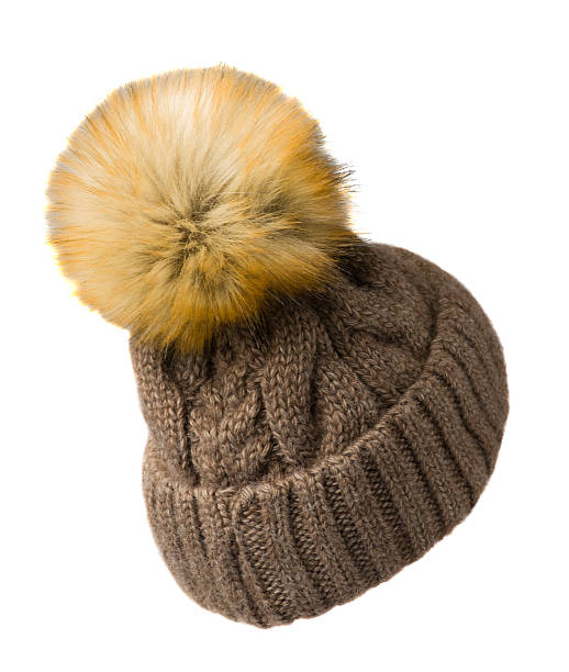 istock Women's knitted hat isolated on white background.hat with pompo 624697654