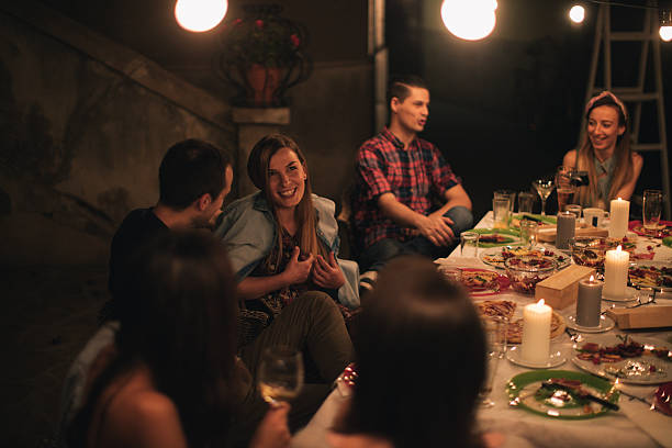 istock Smiling friends at the dinner party 624698660