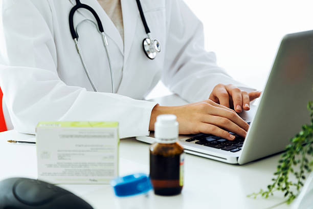 istock Female doctor working with laptop in the office. 624701012