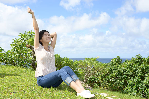 Analog toned image of a young woman on a summer vacation