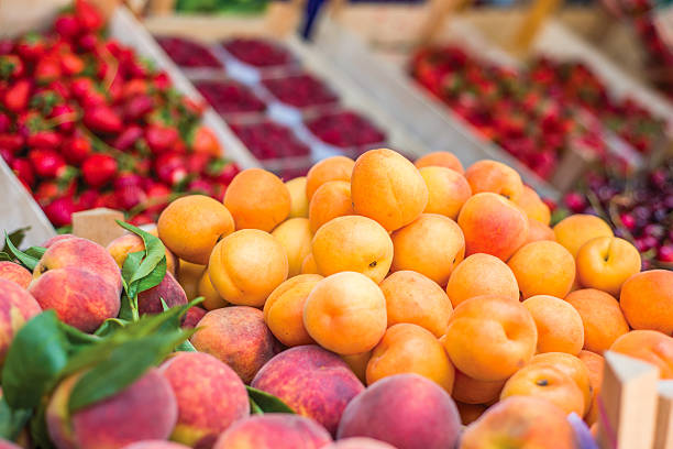 istock Apricots on display at green market 624709936