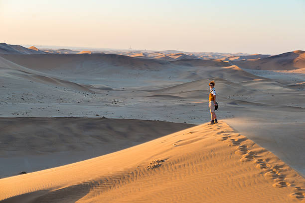 istock Walking on the sand dunes, Namibia, Africa 624710120