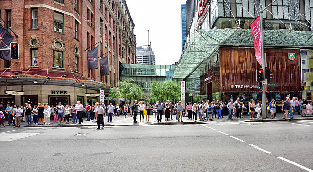 istock People crowd crossing street in central Sydney 624714006