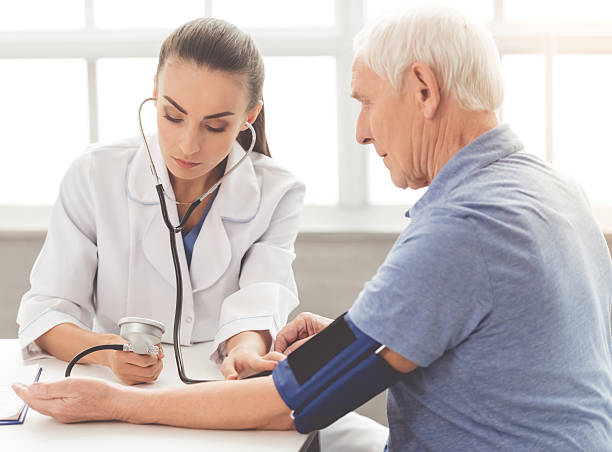 istock Beautiful doctor and patient 624714570