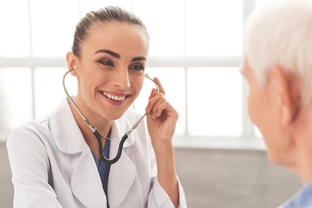 istock Beautiful doctor and patient 624715584