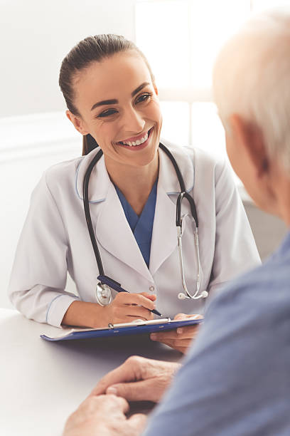 istock Beautiful doctor and patient 624715794