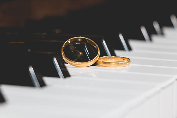 istock wedding rings piano key 624715808