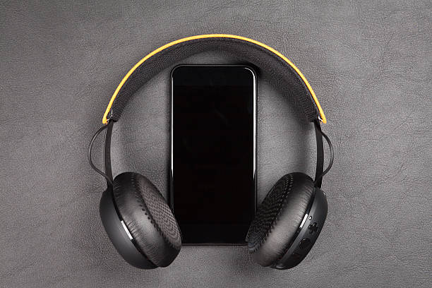 istock Black modern smartphone and headphones 624719274
