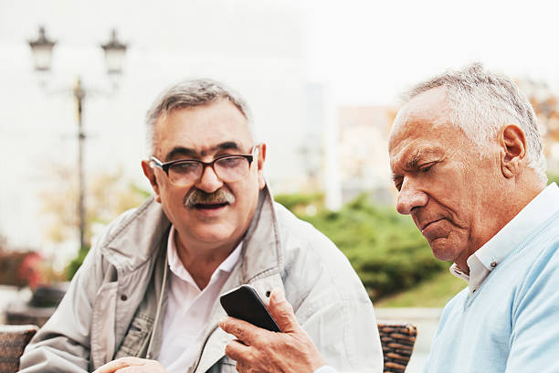 istock Senior friends enjoying outside 624719336