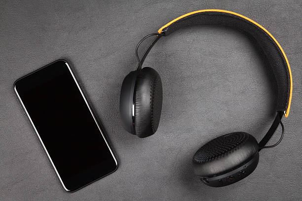 istock Black modern smartphone and headphones 624719514