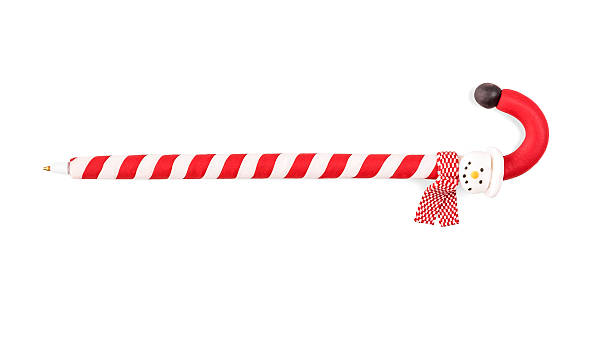 istock Pen in the shape of a Christmas candy. 624721916