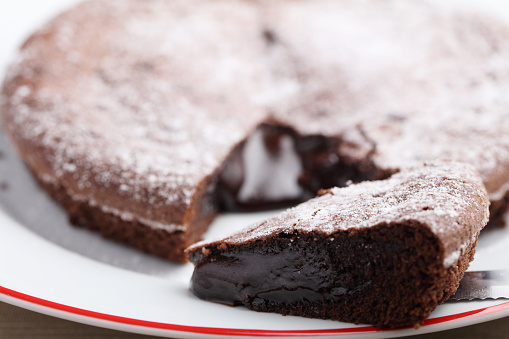 Slice of chocolate mud cake closeup