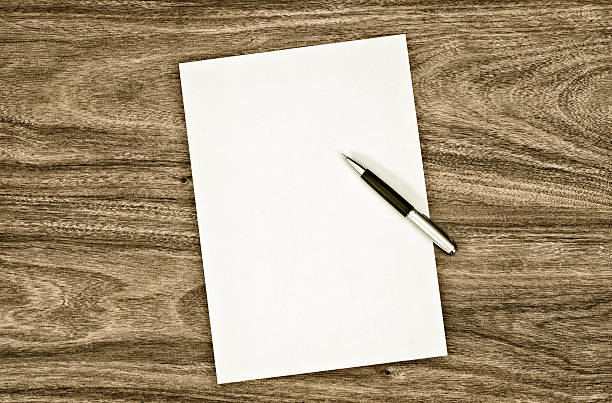 istock blank paper on the desk 624722118