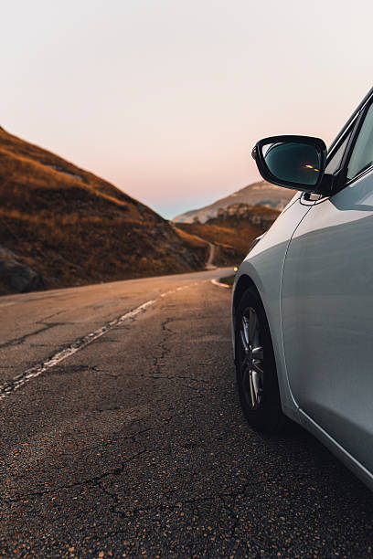 istock Countryside road and car 624722238